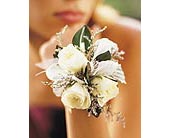 3 White Mini Roses Wristlet in Sewell NJ, Lamp Light Florist And Gift